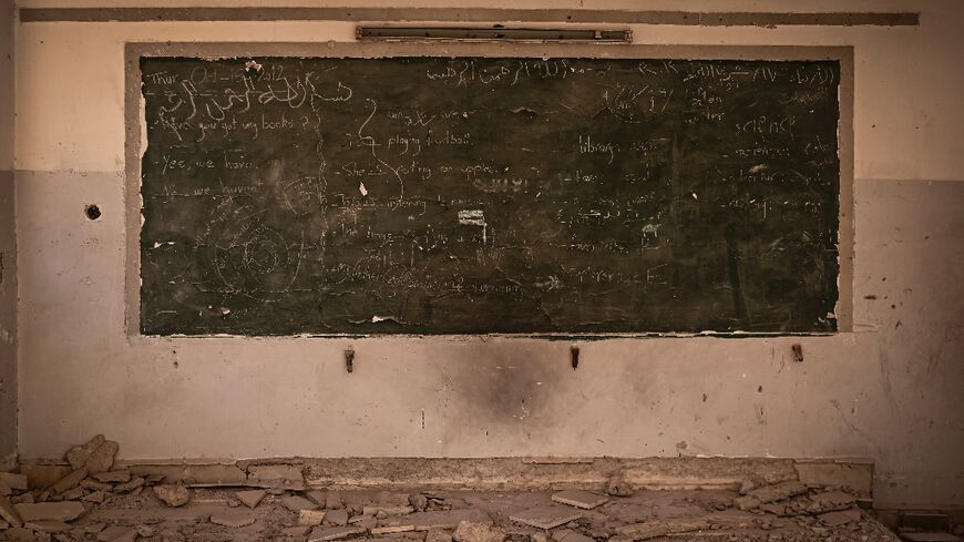 The last lesson in this Yarmuk elementary school is still on the board, 12 years after the Palestinian camp was engulfed in Syria's civil war