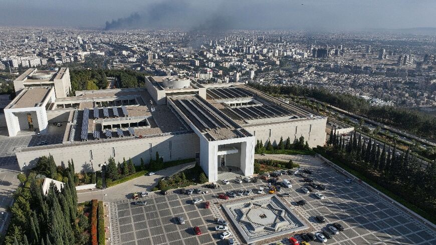 An aerial photo shows the Syrian presidential palace in Damascus's Mount Qasyoun, after Islamist-led rebels seized the capital