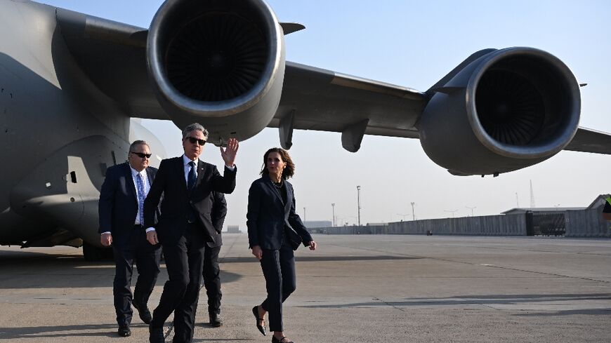 US Secretary of State Antony Blinken is welcomed by US officials upon landing in Baghdad, during his regional tour focused on Syria