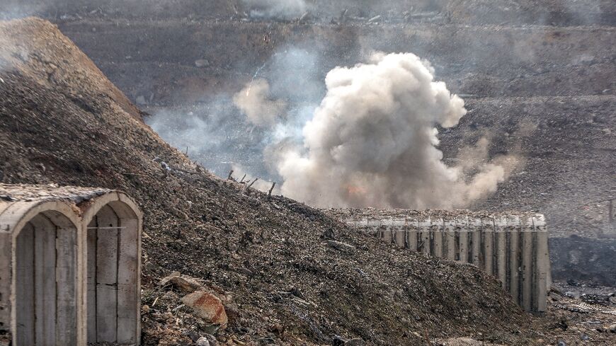 Several hours after a Syrian bunker complex outside the port of Tartus was hit in a suspected Israeli strike damaged munitions continued to explode