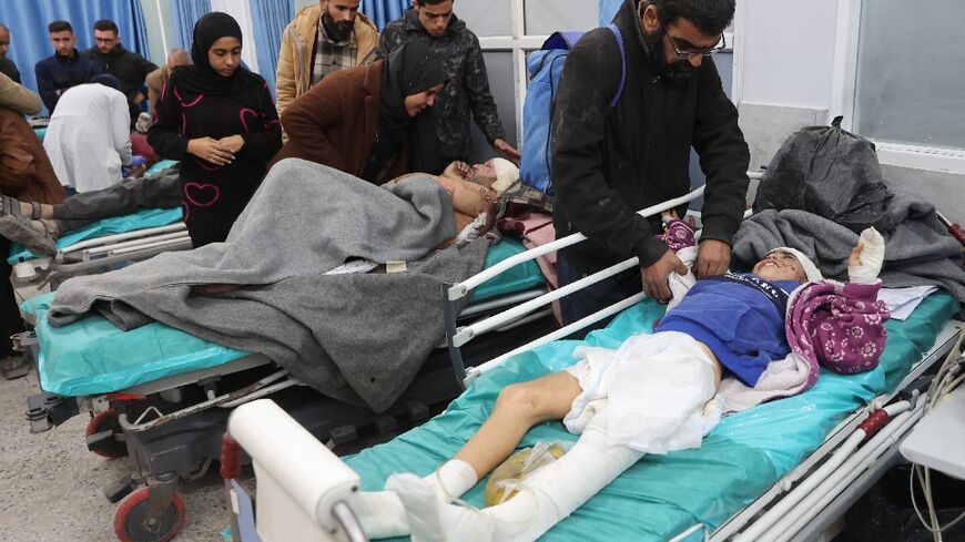 Wounded Palestinians receive medical attention at the Al-Shifa hospital in Gaza City