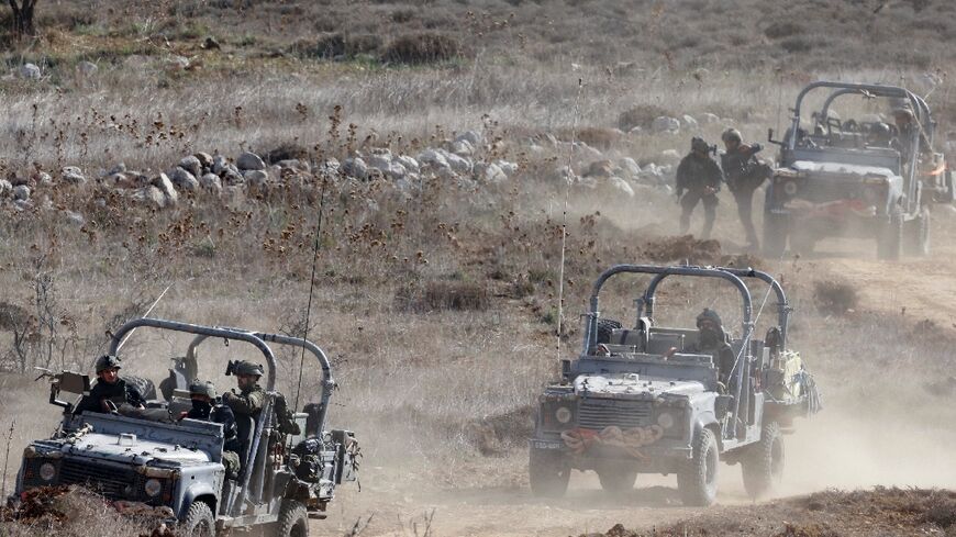 Israeli troops deploy inside the UN-patrolled buffer zone that is supposed to separate Israeli and Syrian forces on the Golan Heights.