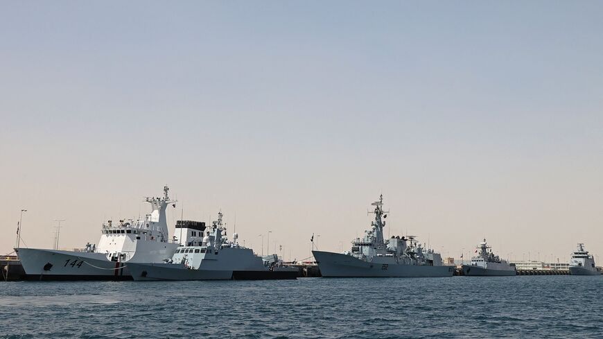 A general view shows warships docked at Hamad Port during the Doha International Maritime Defence Exhibition & Conference (DIMDEX), in the Qatari capital Doha on March 20, 2022. 