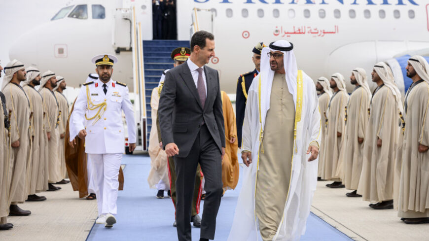 [2/7]Syria's President Bashar al-Assad meets with President of the United Arab Emirates Sheikh Mohamed bin Zayed Al Nahyan at the Presidential Airport in Abu Dhabi, United Arab Emirates March 19, 2023. Abdulla Al Neyadi/UAE Presidential Court/WAM