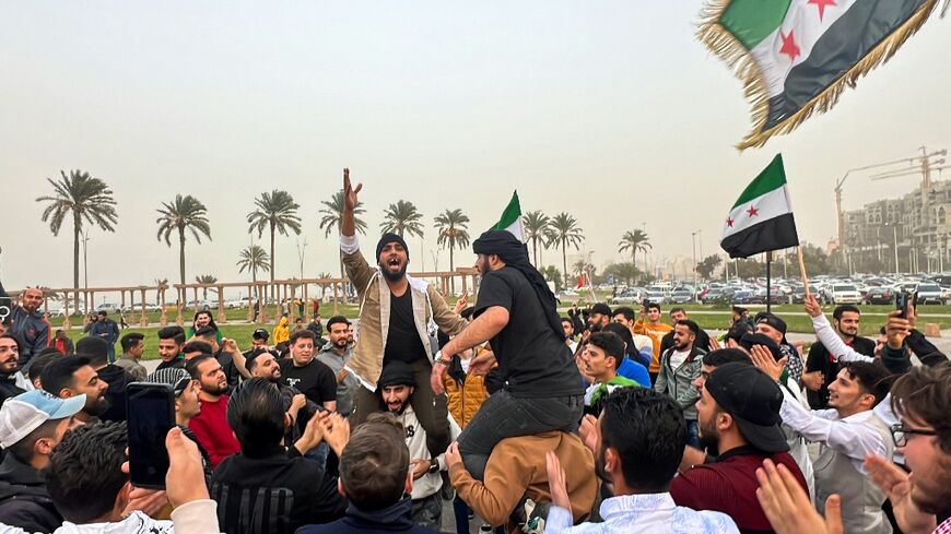 Members of the Syrian community in Libya celebrate the fall of Bashar al-Assad in Tripoli