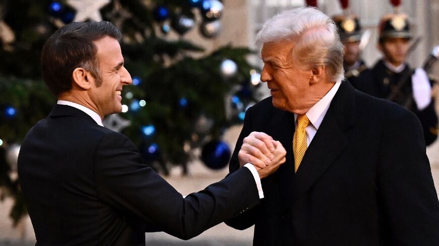 US President-elect Donald Trump, seen here greeting French President Emmanuel Macron in Paris, is already setting out his foreign policy priorities