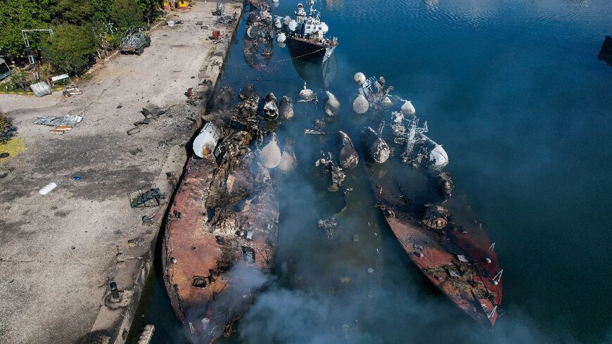 An aerial photo shows Syrian naval ships destroyed during an overnight Israeli attack on the port city of Latakia