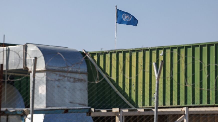 The United Nations flag flies over the West Bank field office of the UN agency for Palestinian refugees in annexed east Jerusalem on Wednesday on the eve of an Israeli deadline for its evacuation