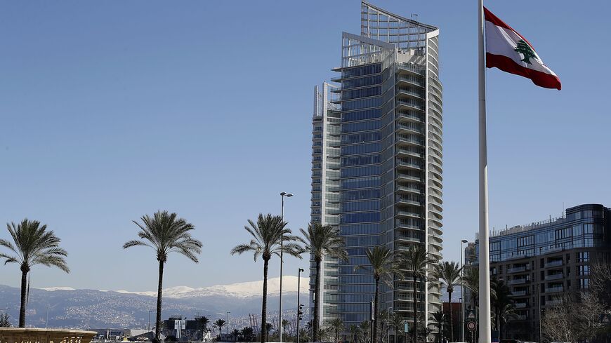 A picture shows the four seasons hotel in Beirut with the snow covered mountain of Sannine in the background on March 8, 2019. (Photo by JOSEPH EID / AFP) (Photo credit should read JOSEPH EID/AFP via Getty Images)