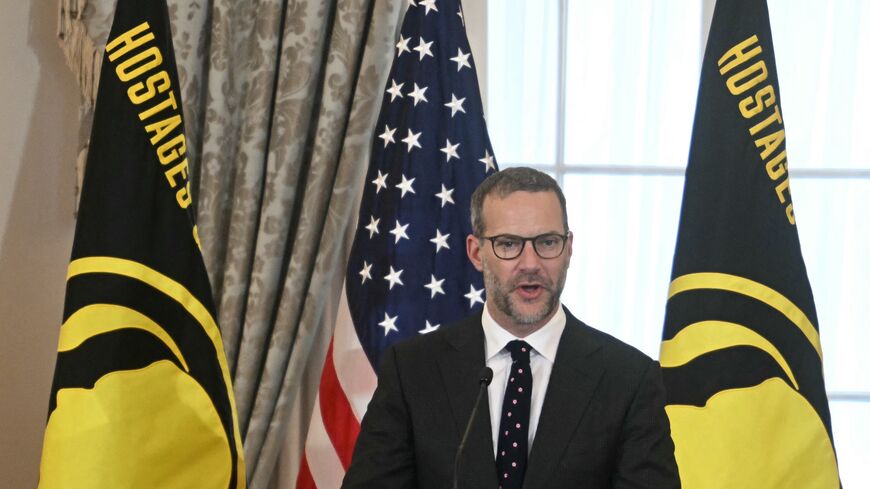 US Envoy for Hostages Adam Boehler speaks during a US hostage and wrongful detainee flag-raising ceremony at the State Department in Washington.