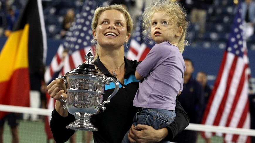 Kim Clijsters of Belgium and daughter Jada after her US Open triumph in 2010