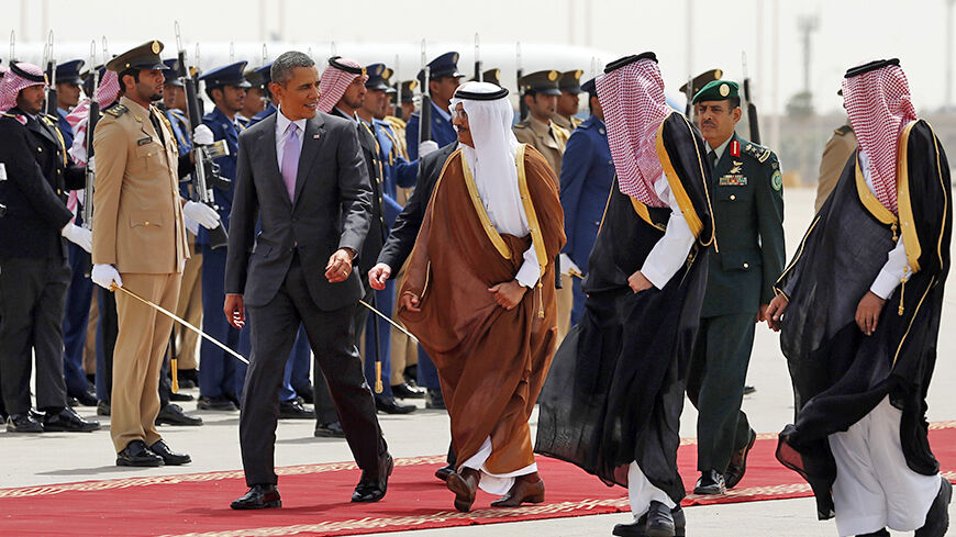 U.S. President Barack Obama (front L) is escorted from Marine One to Air Force One as he departs Saudi Arabia to return to Washington March 29, 2014. Obama sought to reassure Saudi King Abdullah on Friday that he would support moderate Syrian rebels and reject a bad nuclear deal with Iran, during a visit designed to allay the kingdom's concerns that its decades-old U.S. alliance had frayed.      REUTERS/Kevin Lamarque  (SAUDI ARABIA - Tags: POLITICS) - RTR3J2GL