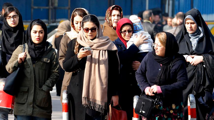 Woman's daring face-off with police van reignites Iran hijab debate ...