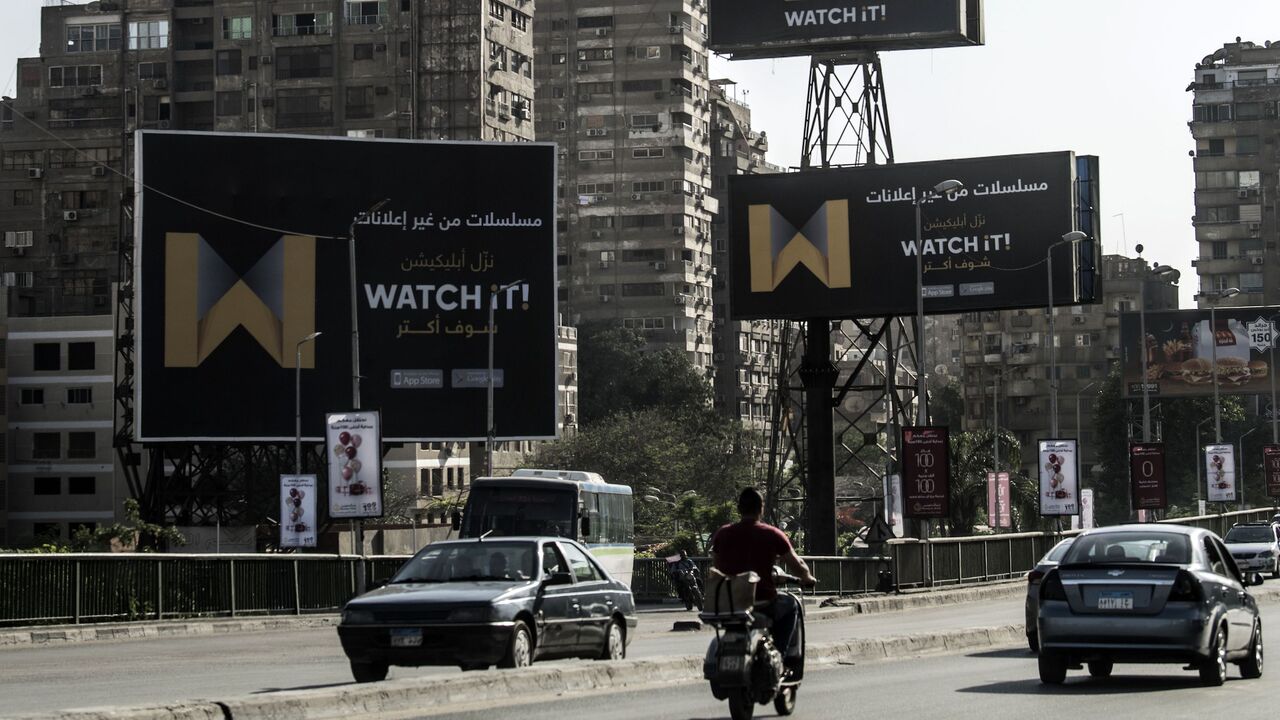 A picture taken on May 7, 2019 shows billboards advertising "Watch iT", Egypt's first video-streaming app, in the capital Cairo. - The video-streaming app was launched this month just in time for the Muslim holy month of Ramadan, the high season for the television industry, but its debut has been dragged by critics over high prices and technical failures. (Photo by Khaled DESOUKI / AFP) (Photo credit should read KHALED DESOUKI/AFP via Getty Images)