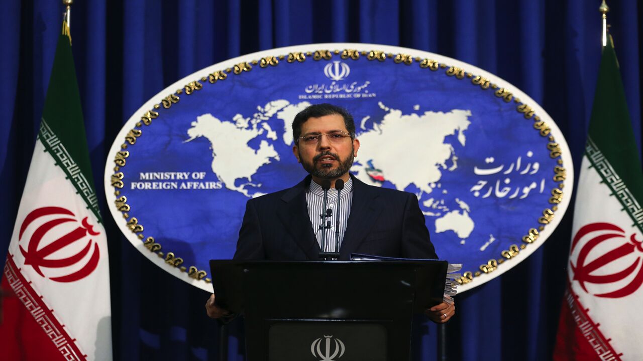 Iranian Foreign Ministry spokesman Saeed Khatibzadeh gestures during a press conference in Tehran on Feb. 22, 2021. Iran hailed as a "significant achievement" a temporary agreement Tehran reached with the head of the UN nuclear watchdog on site inspections. That deal effectively bought time as the United States, European powers and Tehran try to salvage the 2015 nuclear agreement that has been on the brink of collapse since Donald Trump withdrew from it.