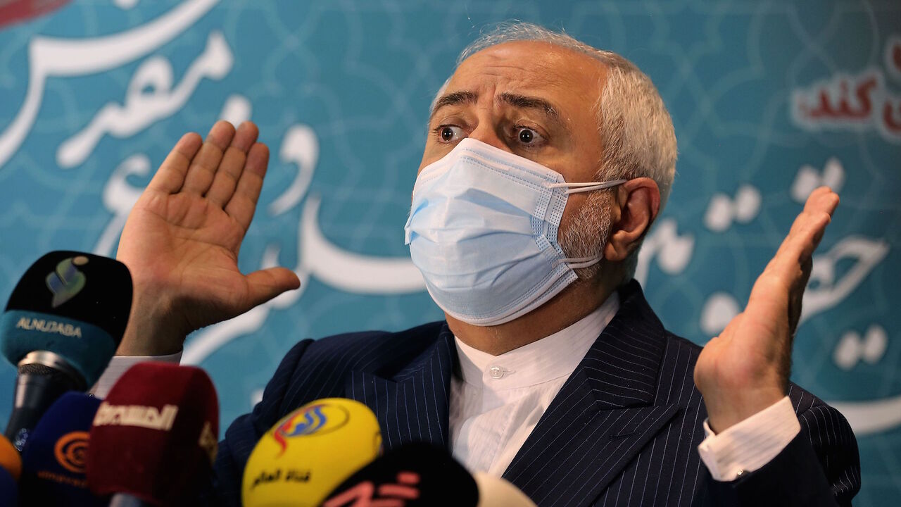 Iranian Foreign Minister Mohammad Javad Zarif speaks during a press conference at the International Conference on the Legal-International Claims of the Holy Defense in the capital Tehran on Feb. 23, 2021. 
