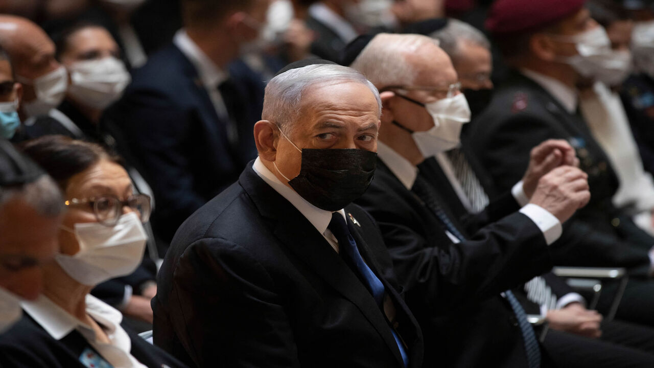 Israeli Prime Minister Benjamin Netanyahu attends a ceremony honoring Israel's fallen soldiers at the Mount Herzel military cemetery during Yom HaZikaron (Remembrance Day), Jerusalem, April 14, 2021.