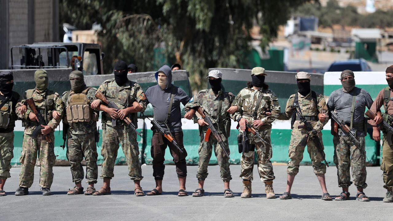 Hayat Tharir al-Sham fighters 