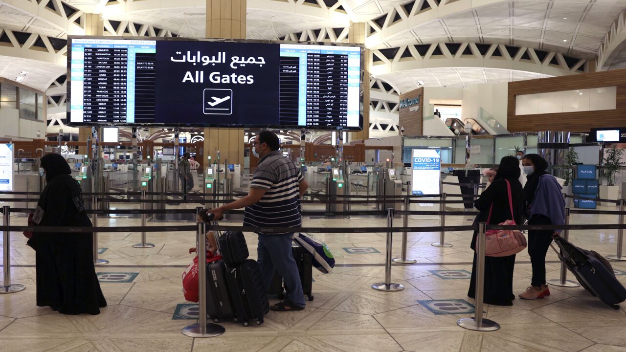 Saudi passengers arrive at King Khaled International airport in the capital, Riyadh, on May 17, 2021, as Saudi authorities lift travel restrictions for citizens immunized against COVID-19.