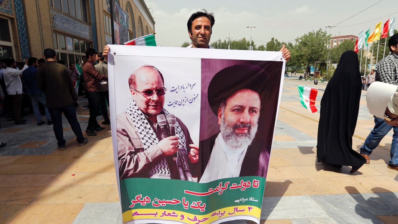 Raisi and Ghalibaf seen on poster