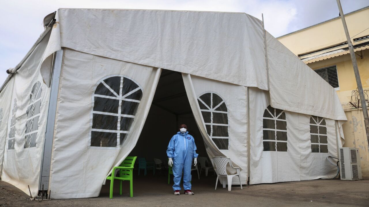 Staff members of the Ministry of Health prepare to take samples for testing for the COVID-19 coronavirus at the testing unit at the Bouffard hospital in Djibouti on May 2, 2020. 