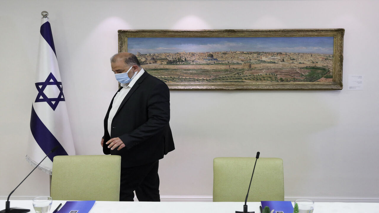 Israeli Arab politician, leader of the United Arab list, Mansour Abbas attends consultations with Israeli President Reuven Rivlin (unseen) on who might form the next coalition government, at the president's residence, Jerusalem, April 5, 2021.