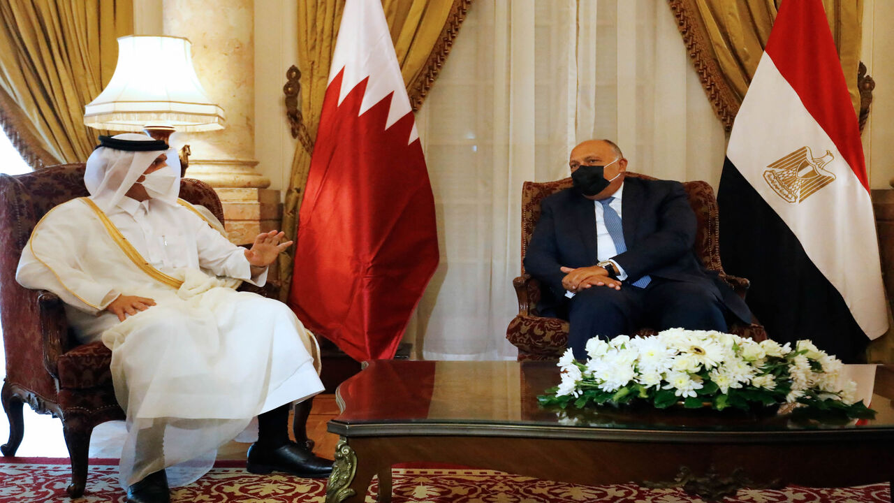 Egyptian Foreign Minister Sameh Shoukry (R) meets with Qatar's Deputy Prime Minister and Minister of Foreign Affairs Mohammed bin Abdulrahman bin Jassim Al Thani, Cairo, Egypt, May 25, 2021.