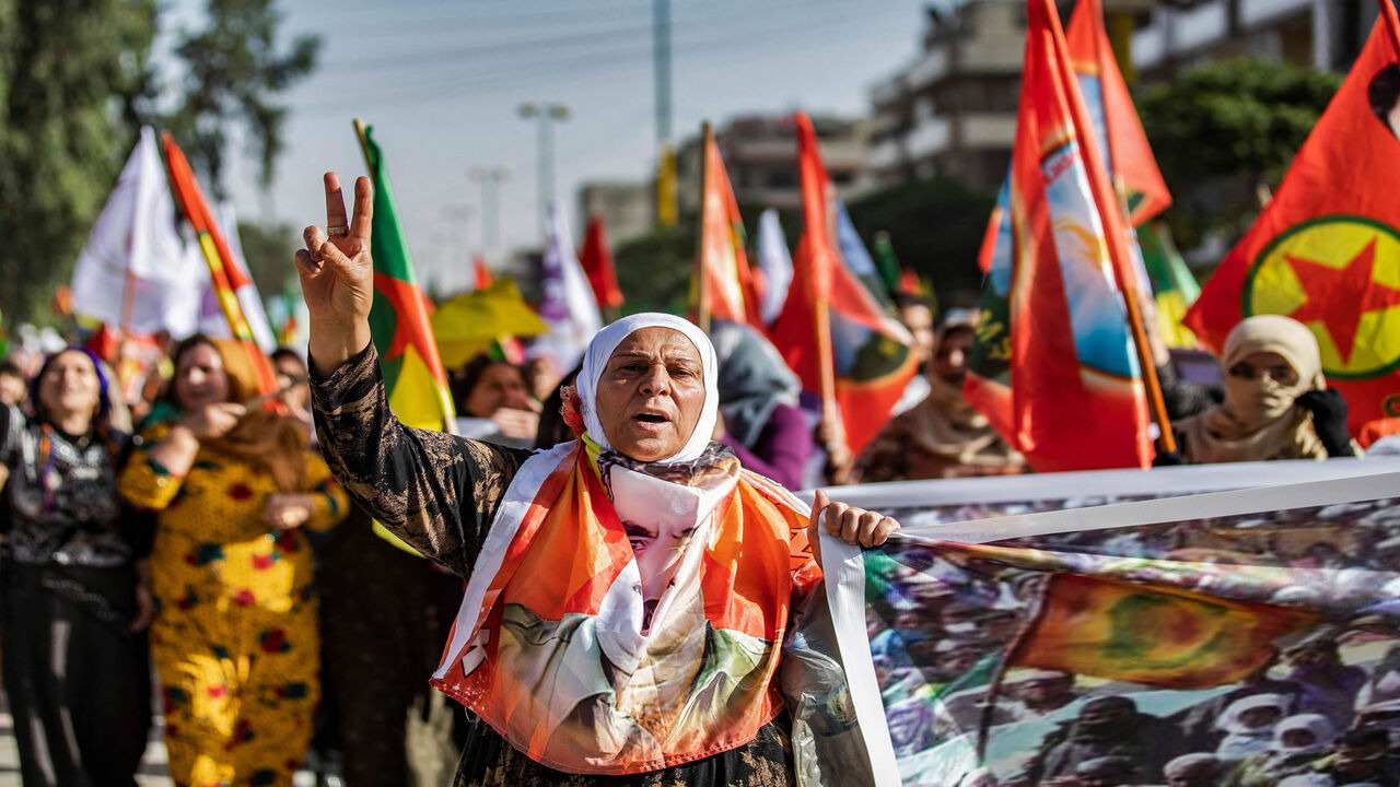 Syrian Kurds demonstrate against the Turkish offensive on Kurdistan Workers Party areas in northern Iraq, in the northeastern city of Qamishli, Syria, June 10, 2021.