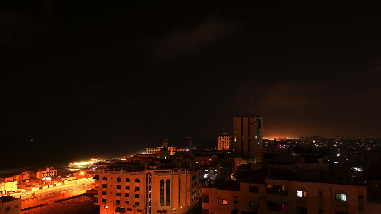 A picture taken early on July 26, 2021, shows a view of Gaza city at night.