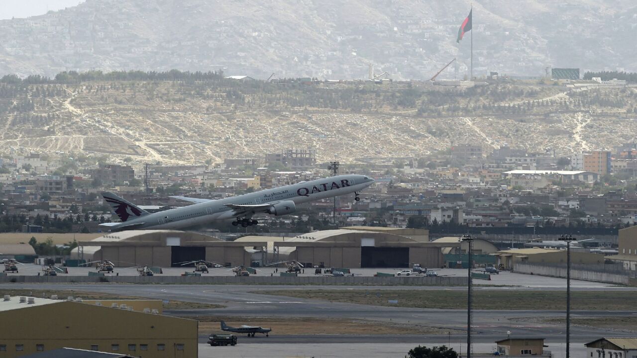 This picture taken on Aug. 14, 2021, shows a Qatar Airways aircraft taking off from the airport in Kabul. 