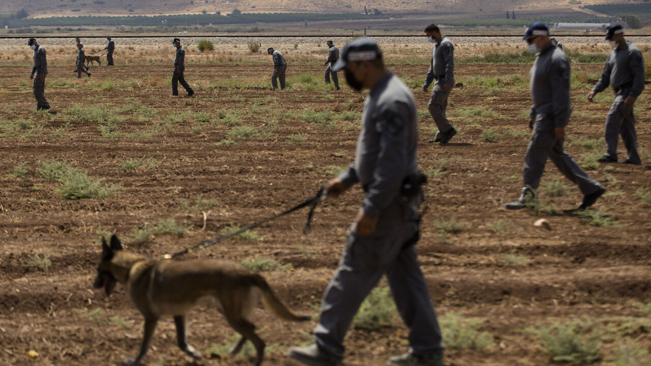 Police officers search as they investigate an area where six Palestinian prisoners managed to escape from Gilboa prison overnight on Sept. 6, 2021 near Kibbutz Beit HaShita in the Gilboa region, Israel. The prisoners, who include Al-Aqsa Martyrs' Brigade leader Zakaria Zubeidi, are believed to have escaped through a tunnel overnight.