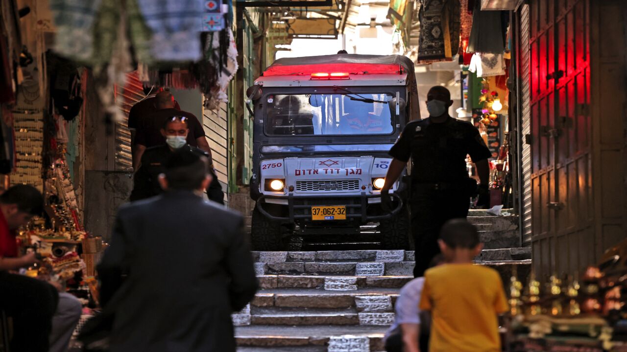 An ambulance arrives at the scene of an attempted stabbing attack in Jerusalem's Old City, on Sept. 10, 2021. 