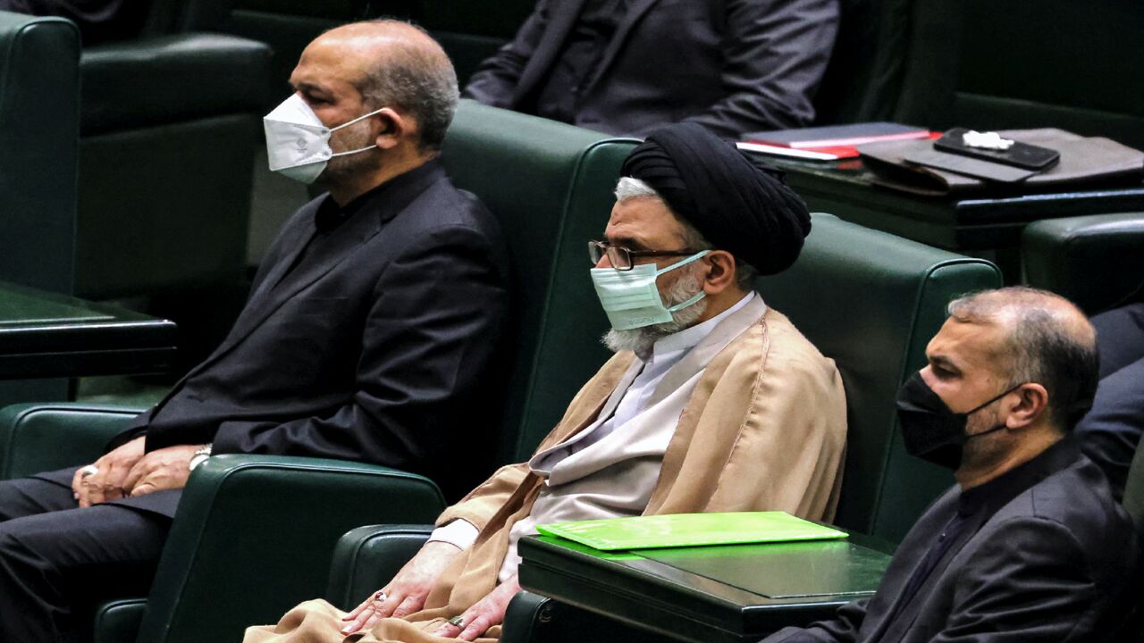 Ahmad Vahidi (interior ministry), Esmail Khatib (intelligence ministry), and Hossein Amir-Abdollahian (foreign ministry) attend a parliament session in the capital Tehran on Aug. 21, 2021.