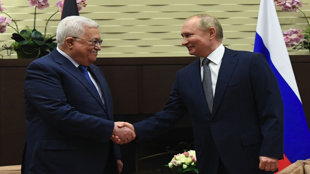 Russian President Vladimir Putin meets with Palestinian President Mahmoud Abbas in Sochi on Nov. 23, 2021.
