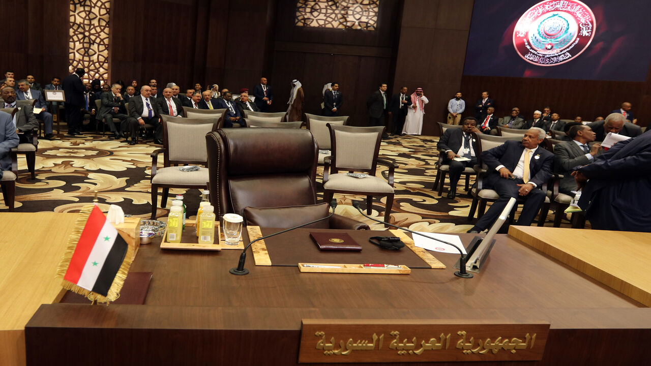 The empty seat of the representative of Syria is seen during the Arab League summit, Sweimeh, Jordan, March 29, 2017.