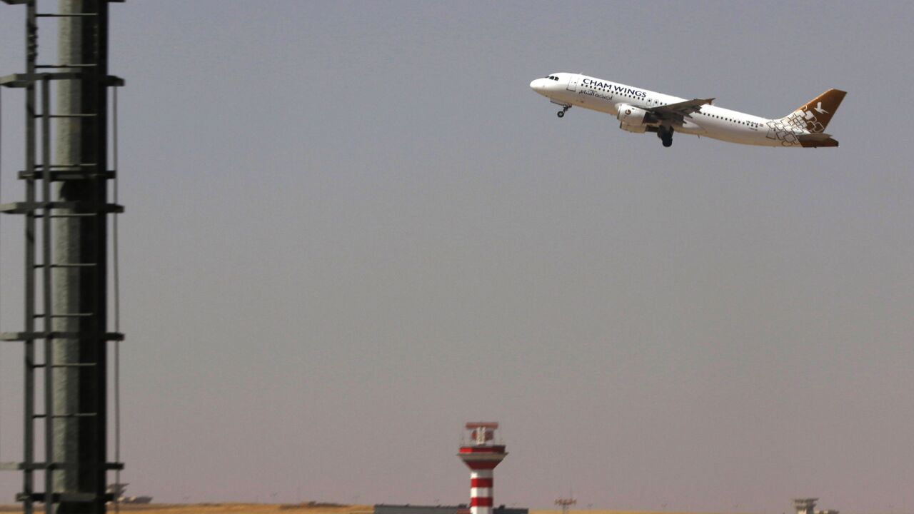 A Cham Wings plane, a private Syrian airline, is pictured taking off from Erbil airport Iraq's autonomous northern Kurdish region, on Sept. 28, 2017. 