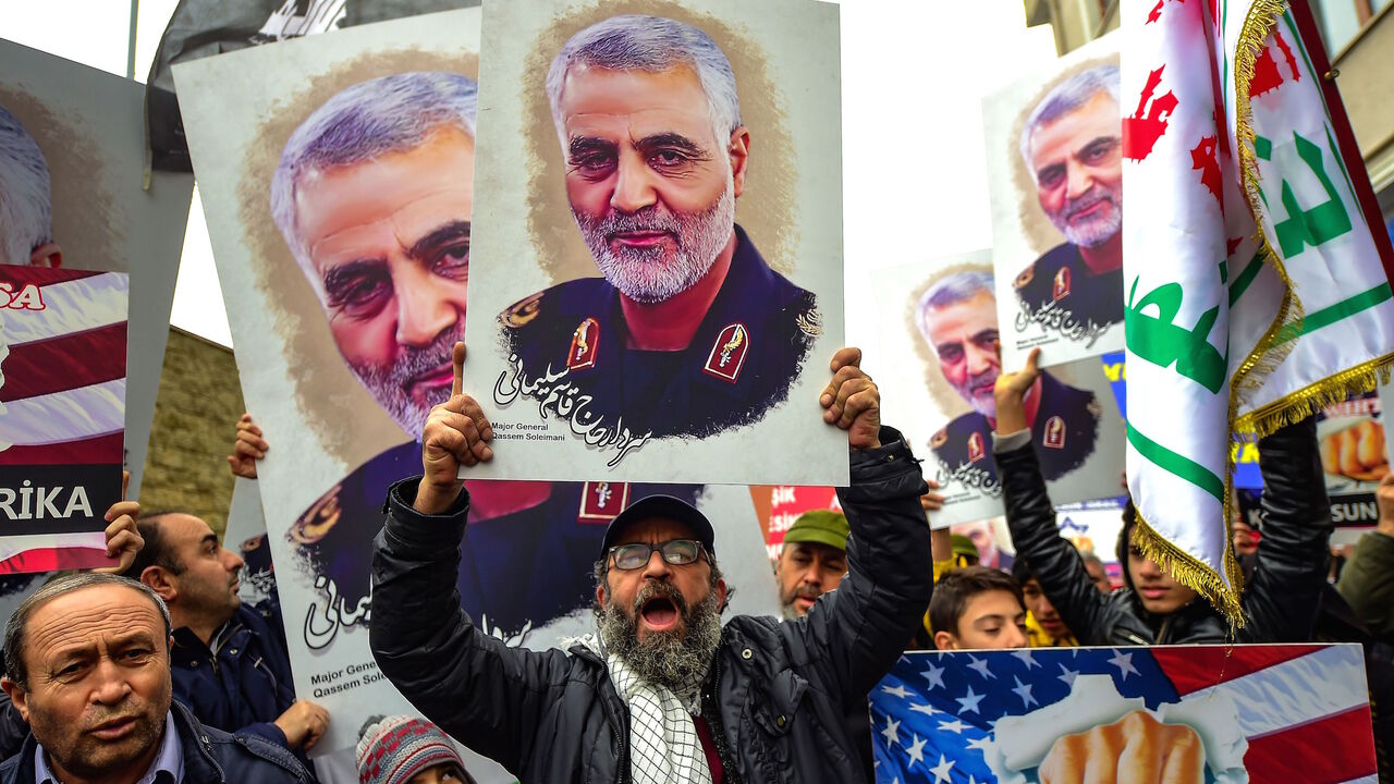 Protesters hold pictures of Iranian commander Qasem Soleimani, during a demonstration outside the US consulate in Istanbul, on Jan. 5, 2020, two days after top Iranian commander Qasem Soleimani was killed by a US drone strike. 