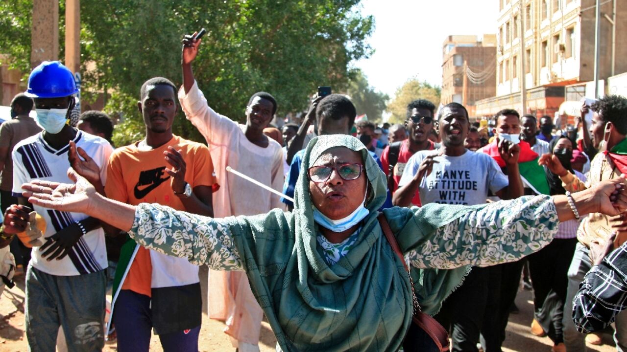 Sudanese protesters call  for civilian rule and denounce the military in the capital Khartoum's twin city of Omdurman on Monday