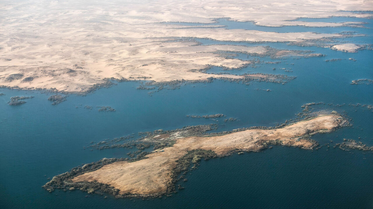 An aerial view shows a small island in the Lake Nasser reservoir formed by the Nile River, about 12 kilometers (7 miles) south of the High Dam near the city of Aswan, southern Egypt, Jan. 2, 2021.