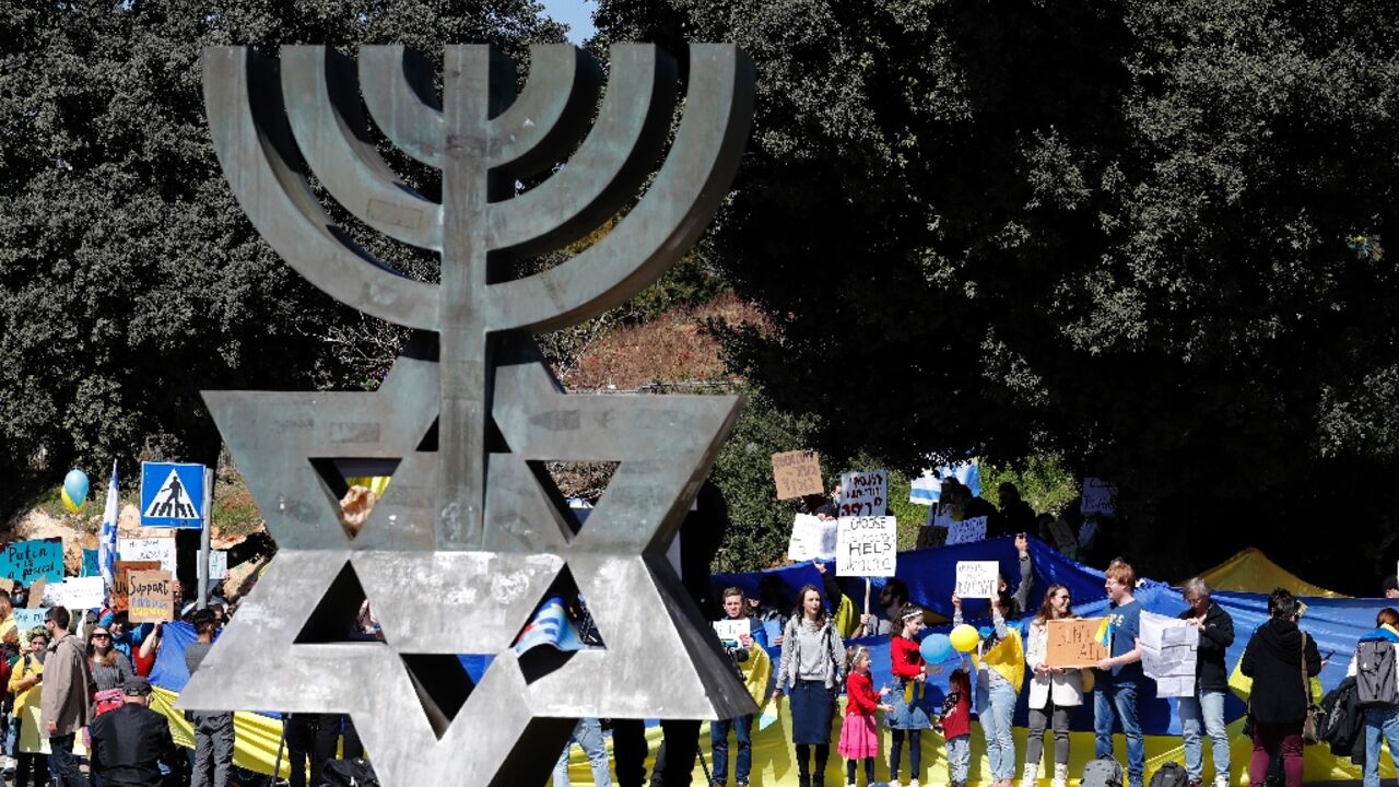 Demonstrators protest outside Israel's parliament in Jerusalem against Russia's invasion of Ukraine 