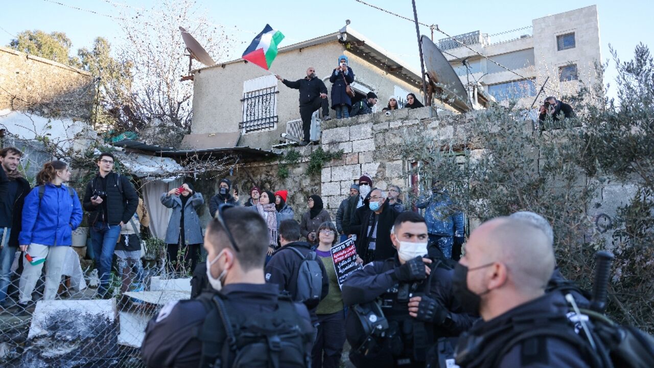 Sheikh Jarrah has become a symbol of Palestinian resistance against Israeli control of Jerusalem; this photo taken on January 21, 2022 shows Israeli security forces deployed as Palestinian, Israeli, and foreign activists demonstrate 