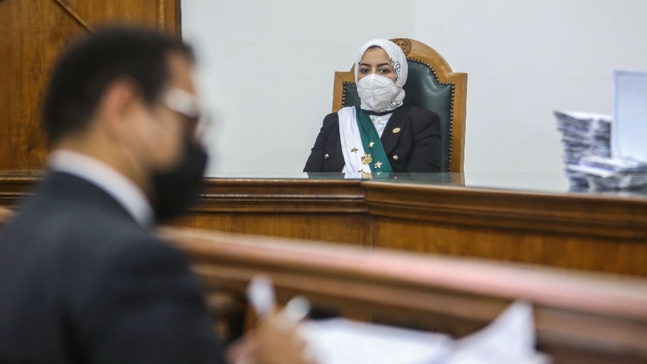 Egyptian female judge Radwa Helmi sits on her first court hearing at the State Council in the capital Cairo
