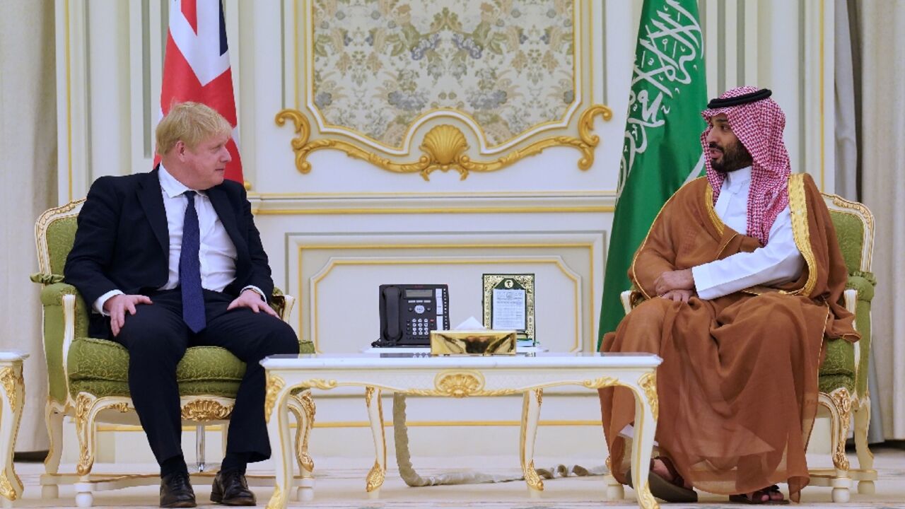 British Prime Minister Boris Johnson is welcomed by Saudi Arabia's Crown Prince Mohammed bin Salman