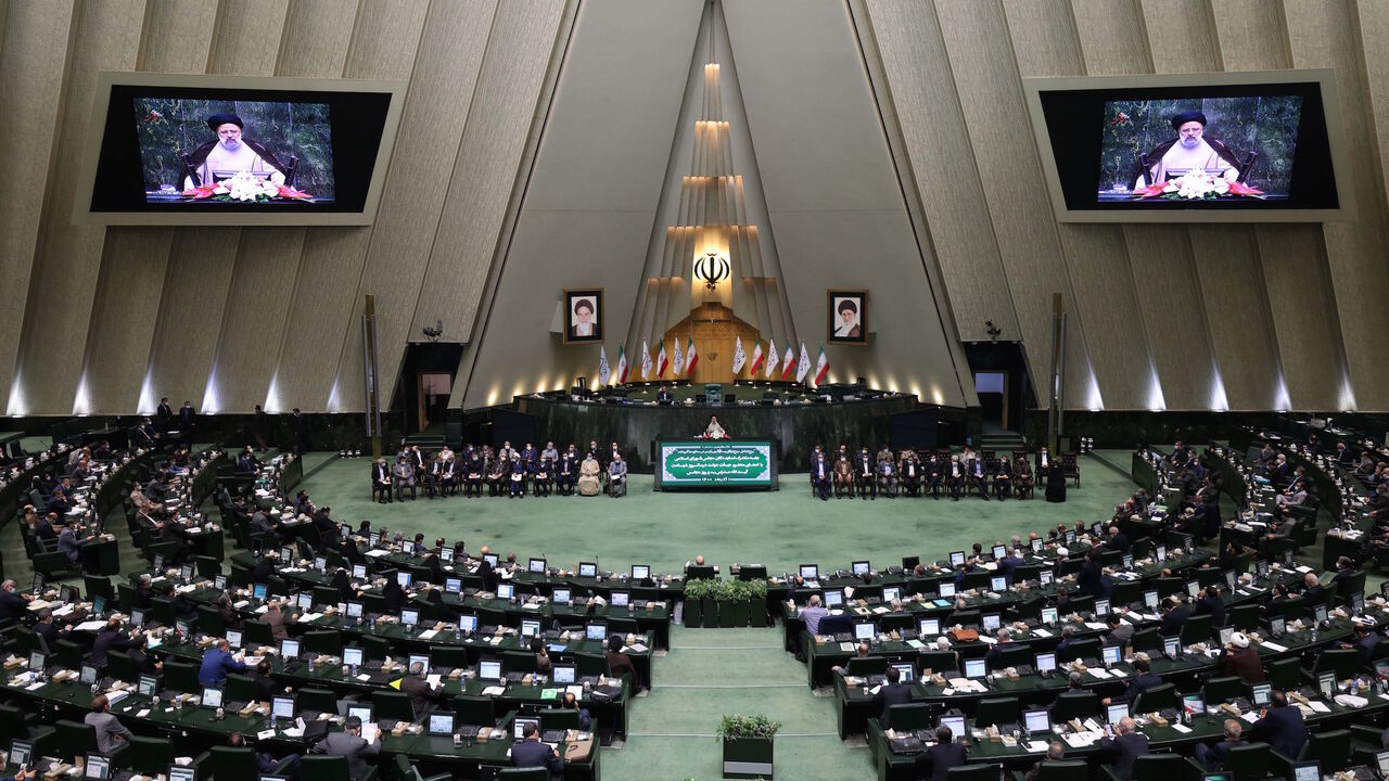 Iranian President Ebrahim Raisi delivers a speech during a parliament session on the occasion of Parliament Day in Tehran on Dec. 1 2021. 