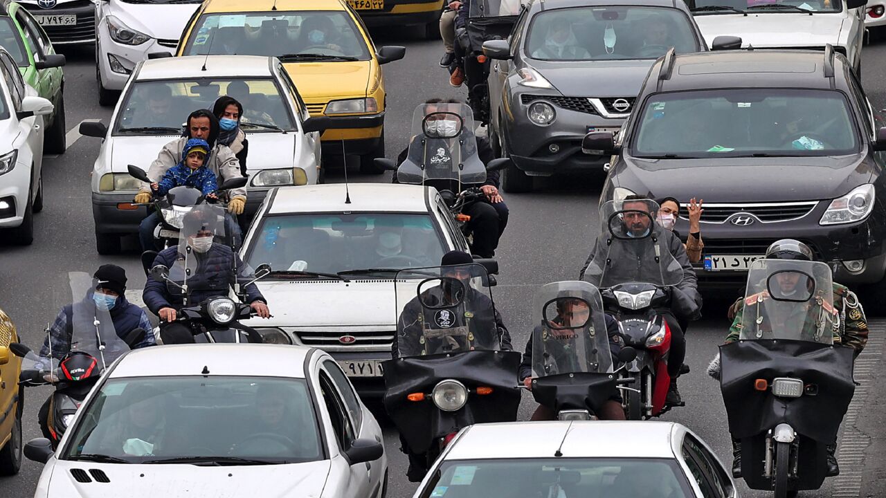 A picture shows vehicles blocked in traffic in the capital, Tehran, on March 9, 2022.