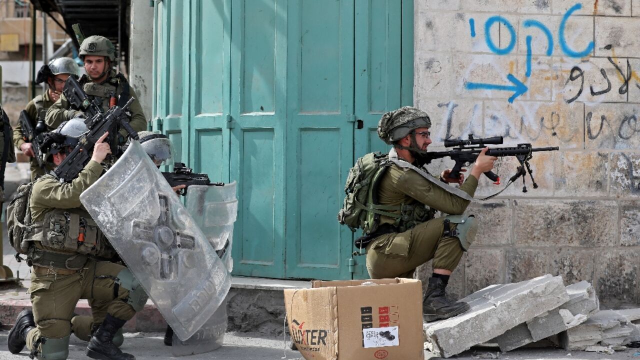 Israeli security forces deploy amid clashes with Palestinian protesters in Hebron, in the occupied West Bank