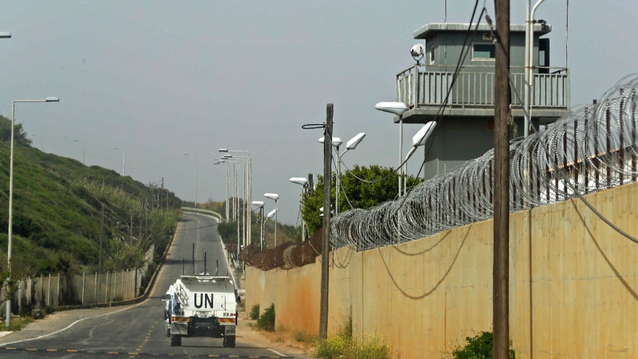 A UN Interim Force in Lebanon vehicle patrols a road in the southern Lebanese town of Naqura, close to the border with Israel, on April 25, 2022, after a projectile was fired from Lebanon into northern Israel, prompting a retaliation