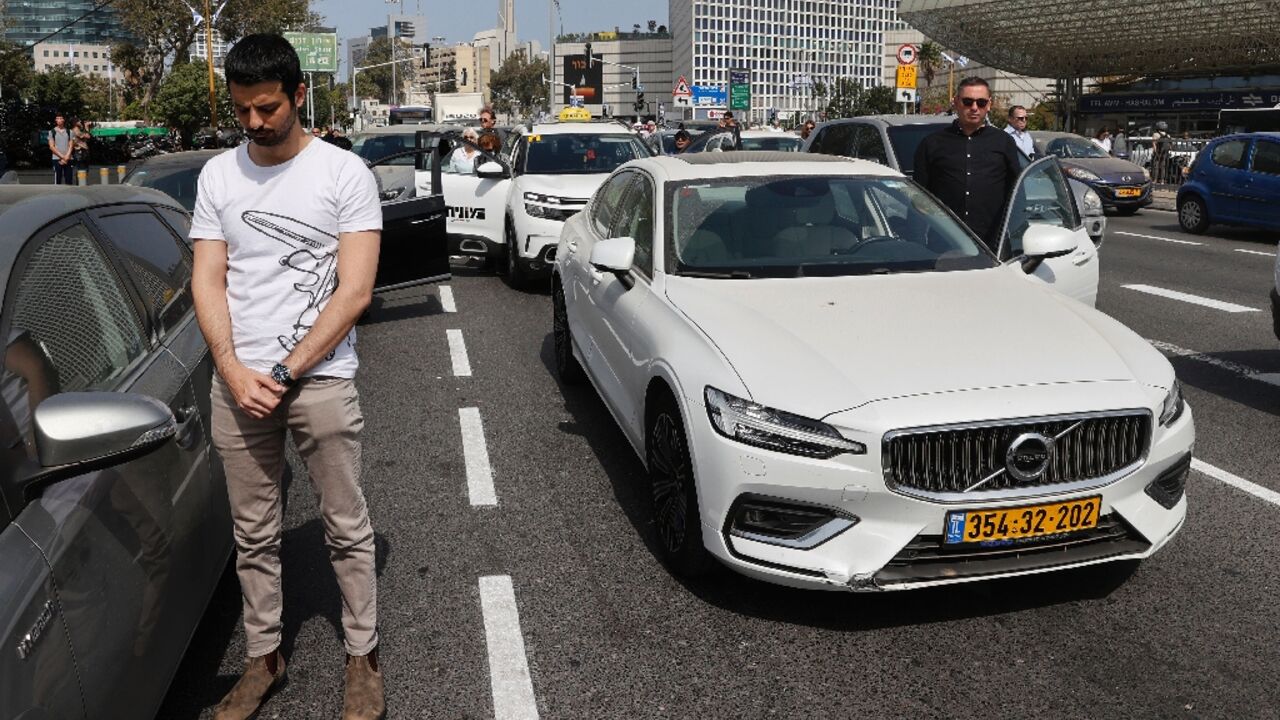 Israeli drivers, including these in Tel Aviv, stopped and stood in silence beside their vehicles to remember victims of the Holocaust