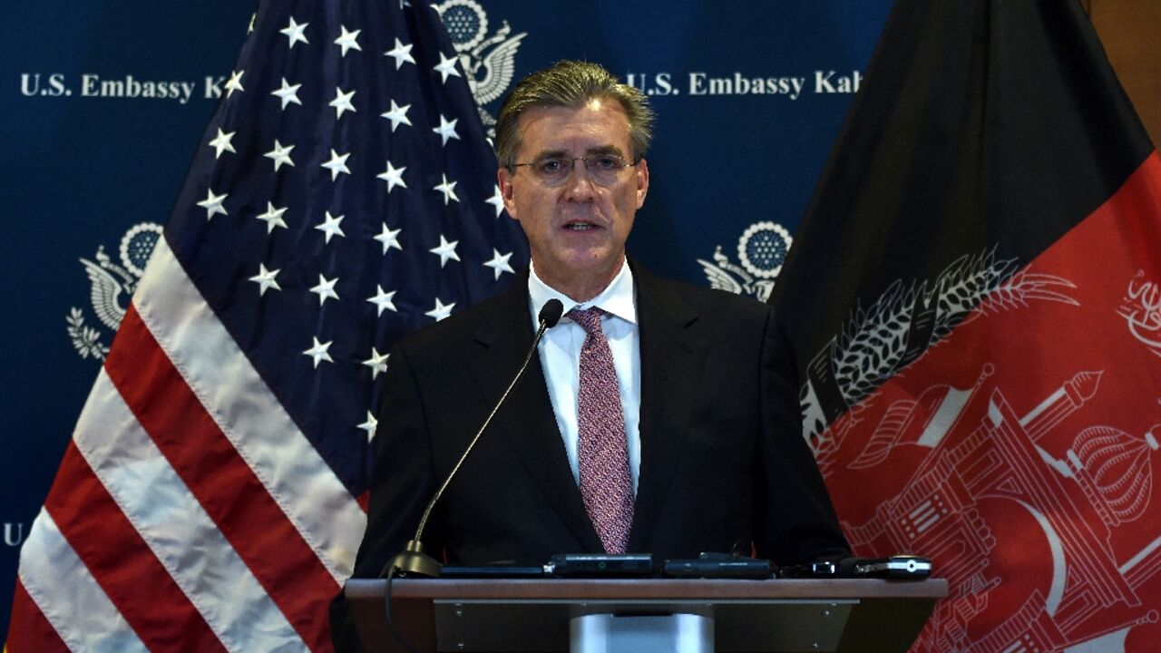 Former US ambassador Richard Olson, seen speaking in Kabul in 2015 as the special envoy on Afghanistan and Pakistan, has pleaded guilty to illegal lobbying