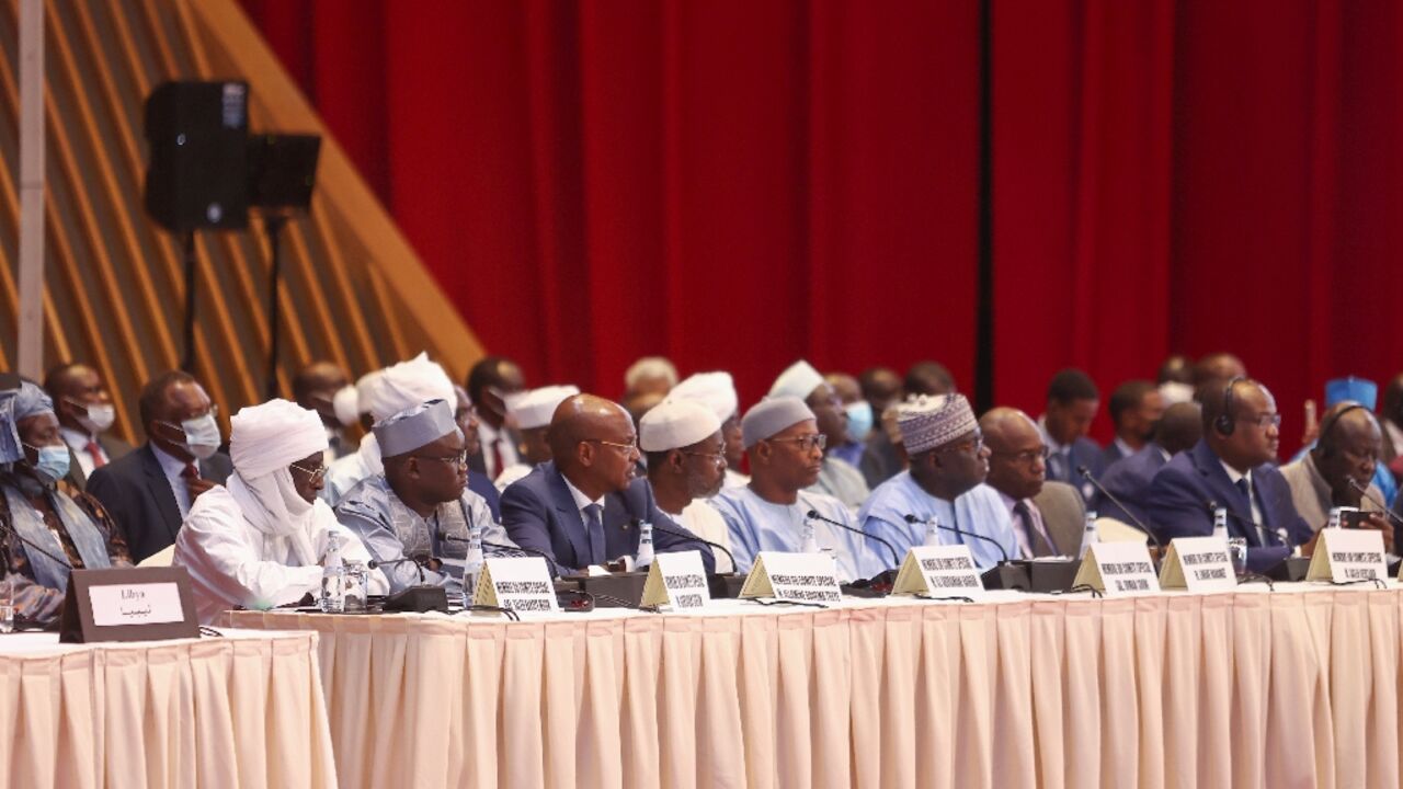 Participants listen to a speech as the Chad Peace Negotiations start in Qatar's capital Doha, on March 13, 2022